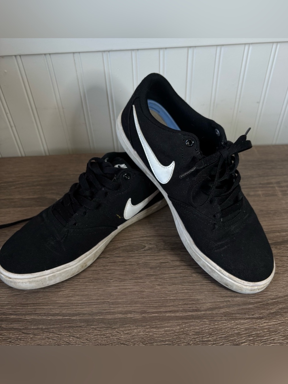 Nike Men’s Black Sneakers with White Swoosh